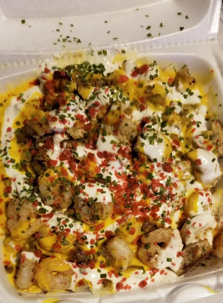 Loaded Baked Potato Shrimp Chicken and Steak