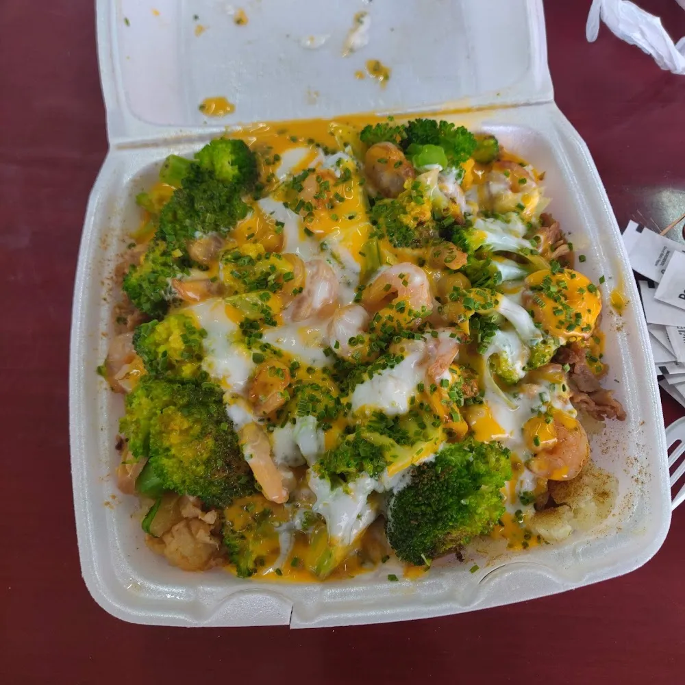 Loaded Potato w Chicken Shrimp and Steak